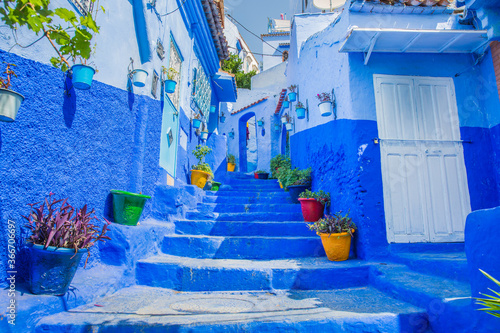 Blue, a means to symbolize the sky and heaven, decorated all over the city of Chefchaouen, Morocco © Mark
