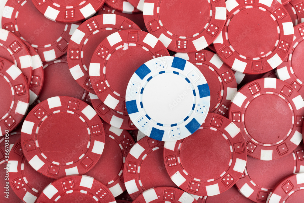 Battle White versus Red yin vs yang Playing Poker Chips laying on the table mixed together. Abstract Pattern Background Battle White versus Red yin vs yang Playing Poker Chips laying on the table mixed together. Abstract Pattern Background