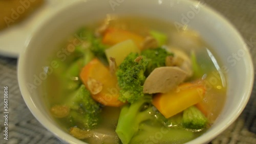 sayur sop or vegetable with chicken soup indonesian culinary photo