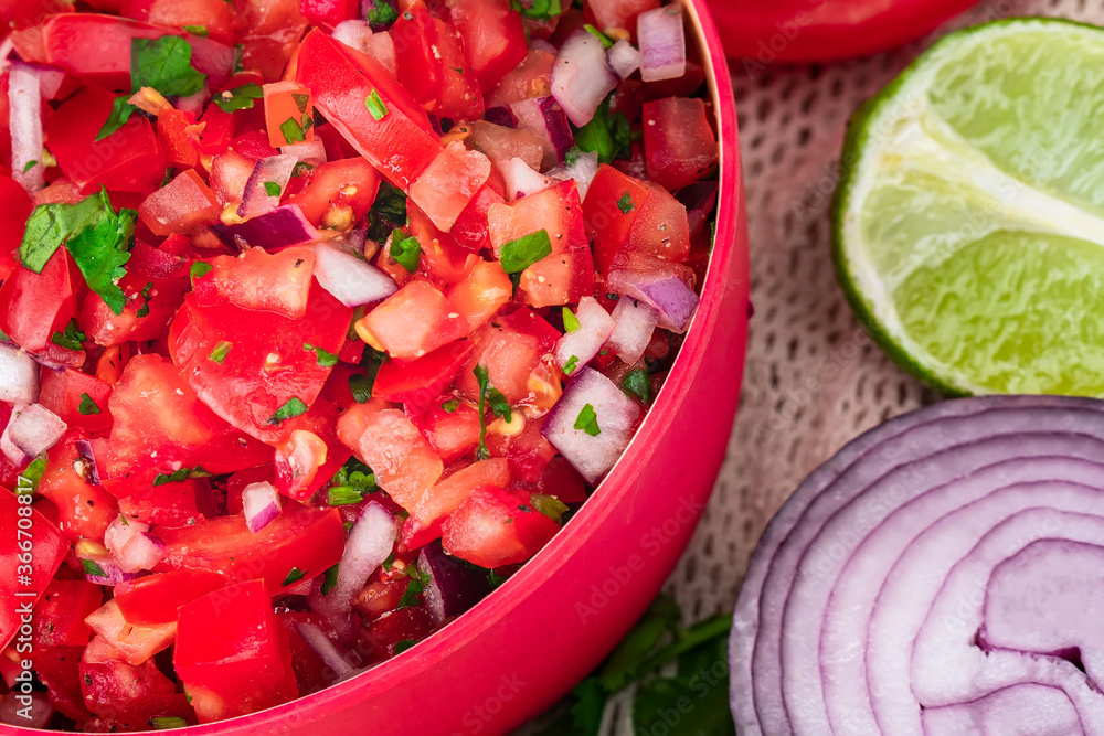 Tomato Salad mixed with red onion Mexican food homemade authentic style