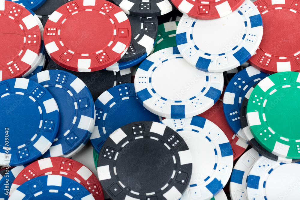 Playing Poker Chips laying on the table mixed together. Abstract Pattern Background Playing Poker Chips laying on the table mixed together. Abstract Pattern Background