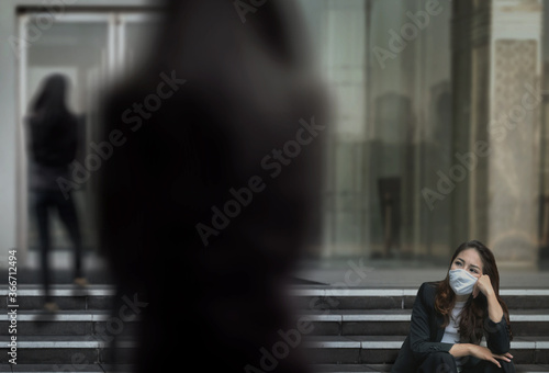 sadness asian businesswoman tired and sit on floor as lost job