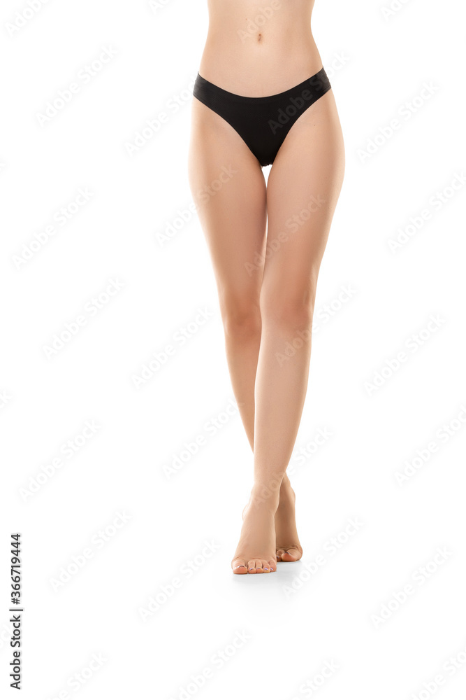 Beautiful female legs, buttlocks and belly isolated on white background. Beauty, cosmetics, spa, depilation, treatment and fitness concept. Sportive, sensual body with well-kept skin in underwear. Beautiful female legs, buttlocks and belly isolated on white background. Beauty, cosmetics, spa, depilation, treatment and fitness concept. Sportive, sensual body with well-kept skin in underwear.