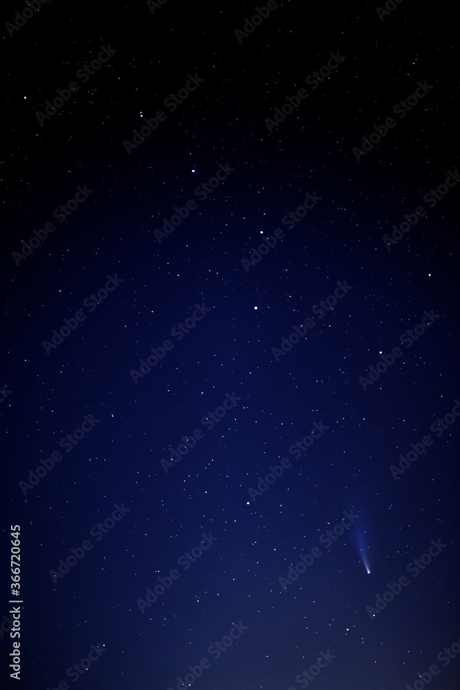 A comet neowise c2020 f3 in the night starry sky near the constellation Big Dipper A comet neowise c2020 f3 in the night starry sky near the constellation Big Dipper