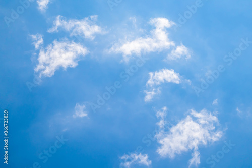 blue sky with cloud closeup. blue sky background with a tiny clouds.