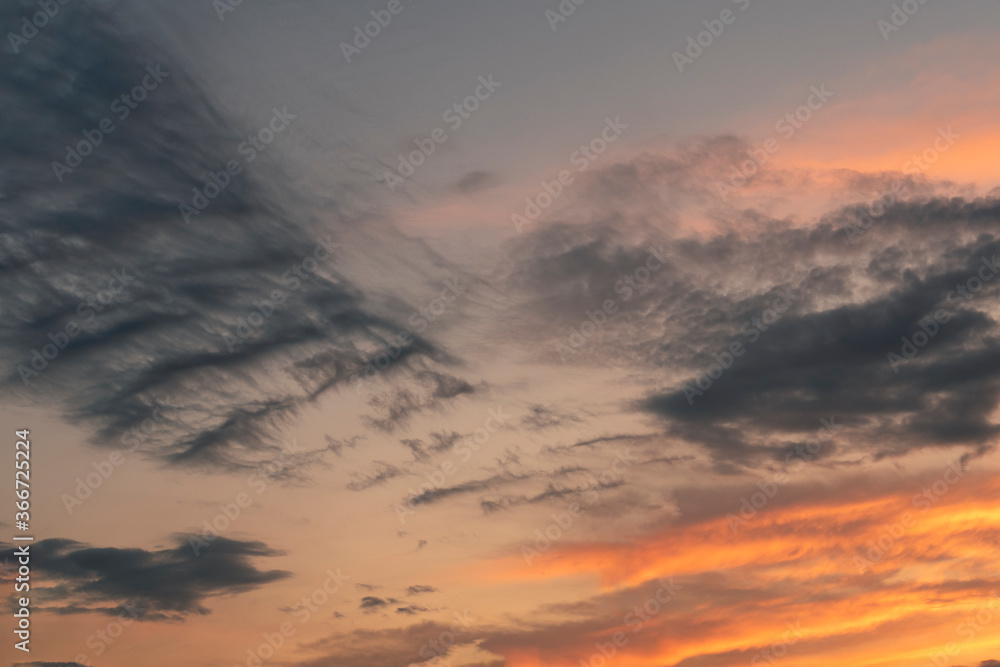 Dramatic cloudscape. Black clouds at sunset time. Background image.