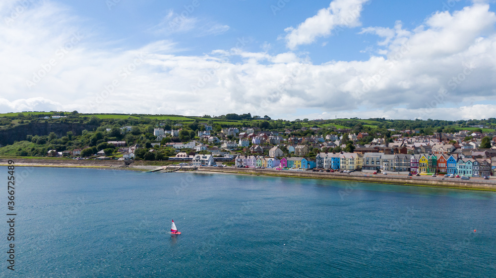 Aerial view on coast in Whitehead, Northern Ireland. Drone photo of town and water of Irish Sea 