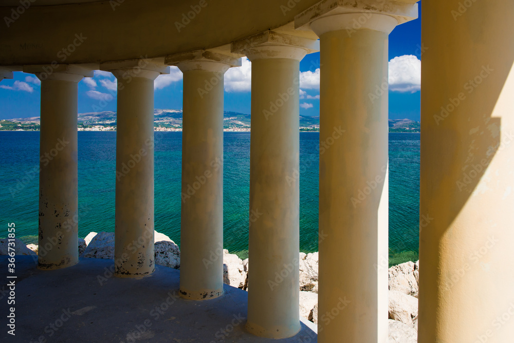 Fototapeta premium lighthouse argostoli. Greek white lighthouse on Kefalonia island in the Ionian Sea 