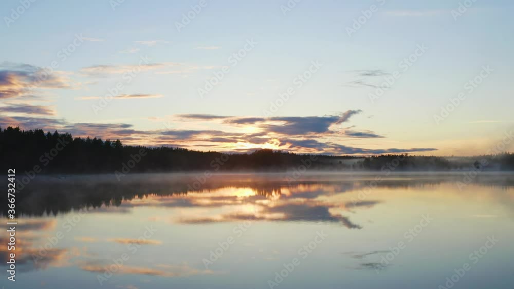 drone shot of sunset over the lake with fog and clouds drone shot of sunset over the lake with fog and clouds