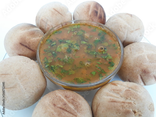 Special Rajasthani dal baati dish with onions photo