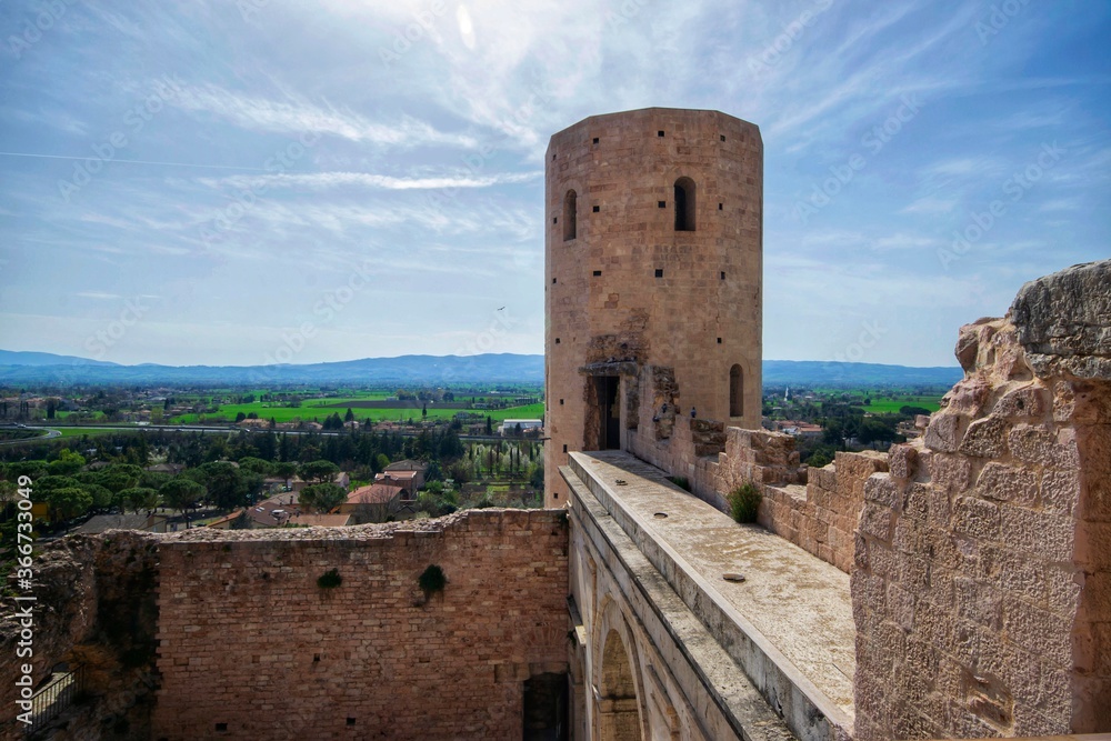 old tower in the historic center of Spello town, Umbria, Italy 