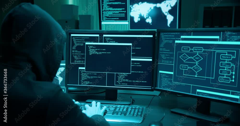 Asian male hacker use laptop