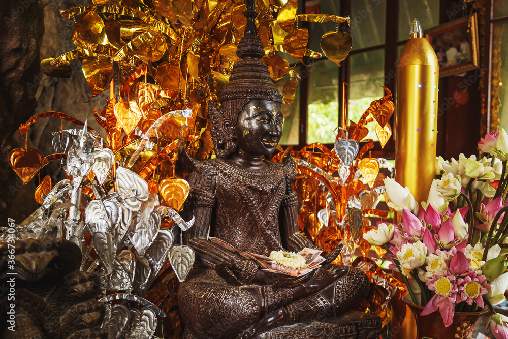 Sacred statue in the temple on Mount Phnom  Kulen.