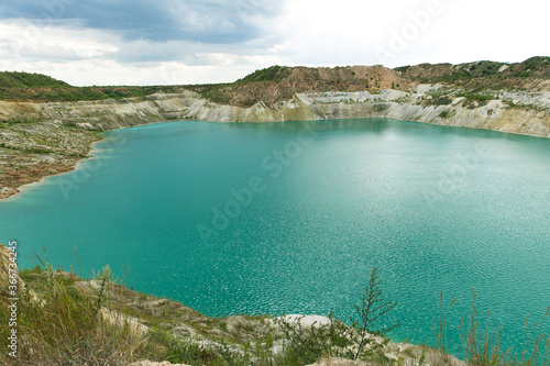 A chalk quarry in the city of Volkovysk in Belarus. Very nice views of light blue water. Dangerous place, not for swimming. 