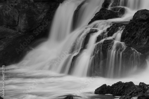 Fototapeta Naklejka Na Ścianę i Meble -  Black and White Image of Waterfall Long Exposure, Les Chutes de La Plaisance, Quebec, Canada