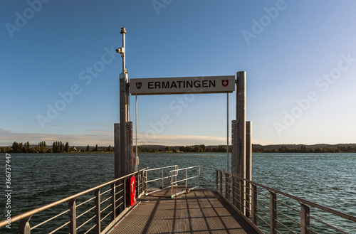 Pier at Ermatingen. Reichenau Island in the background. Lake Constance, Switzerland photo