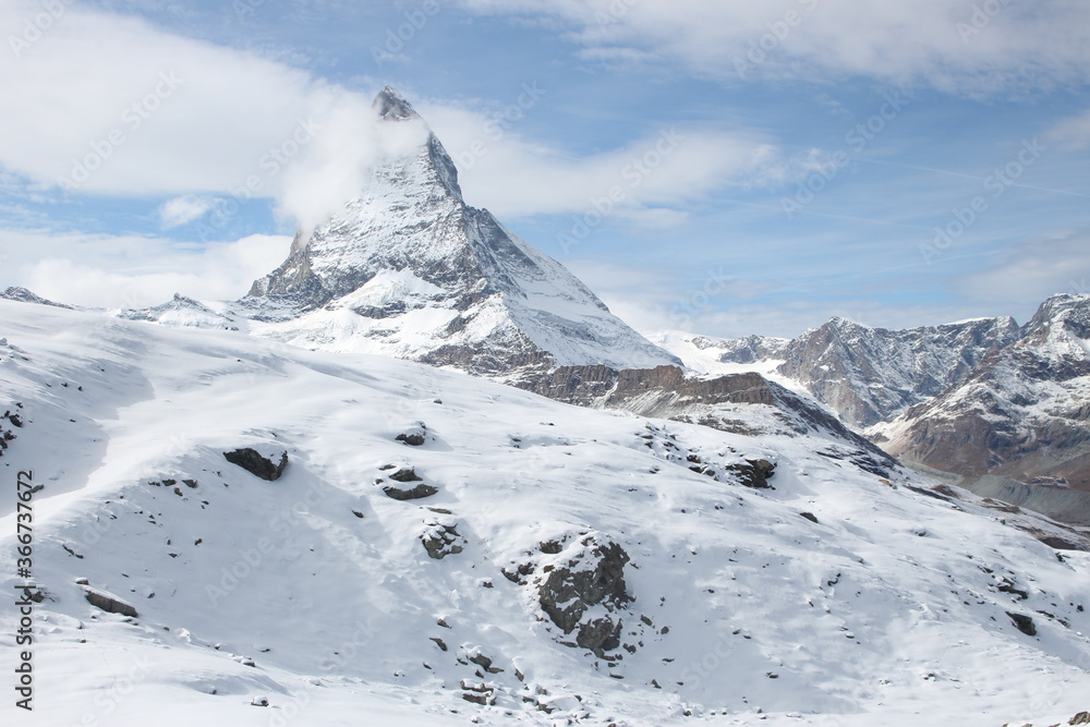 Beautiful and pure famous Matterhorn covers of white snow, looking from Rotenboden and Riffelberg, Zermatt, Switzerland, Europe Beautiful and pure famous Matterhorn covers of white snow, looking from Rotenboden and Riffelberg, Zermatt, Switzerland, Europe