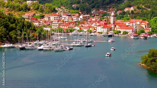 Aerial morning vire of Krka National Park, Prokljansko lake, Croatia, Europe. Picturesque summer cityscape of Skradin port. Beautiful world of Mediterranean countries. Full HD video (High Definition). photo