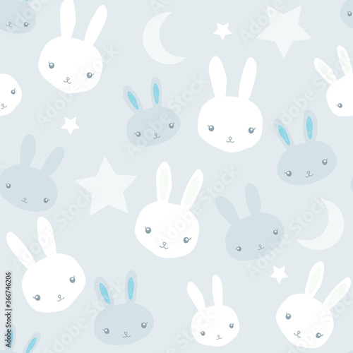 White bunnies and cute rabbits and stars for baby boy nursery seamless pattern on light blue background.