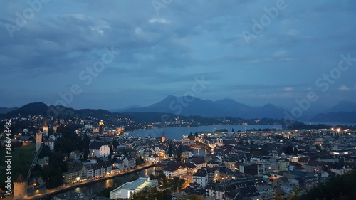 Night Lucerne city aerial view from Château Gütsch in summer, a historic château (castle) in Lucerne, Switzerland, panorama of the city