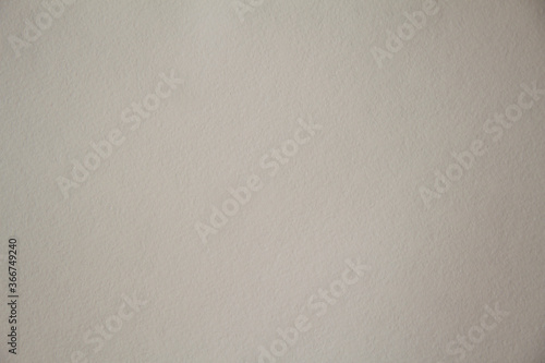 A sheet of thick textured paper of light brown color. Texture or background