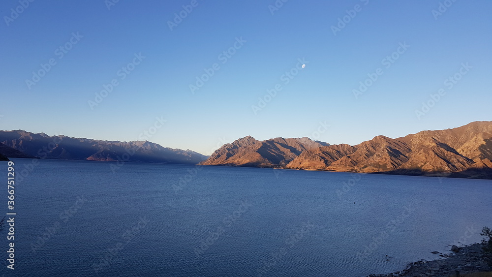 Lake Hāwea (Hawea) with sunset, located in the Otago Region at an altitude of 348 metres, New Zealand, ninth largest lake