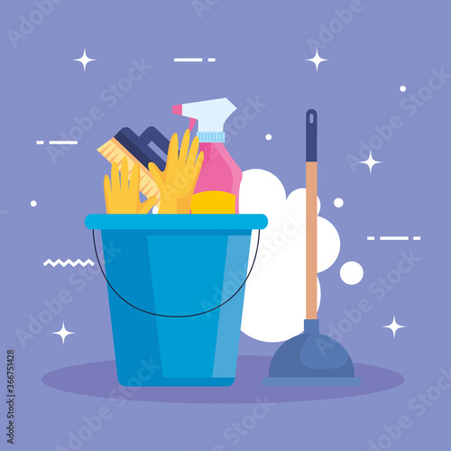 set of cleaning supplies in bucket