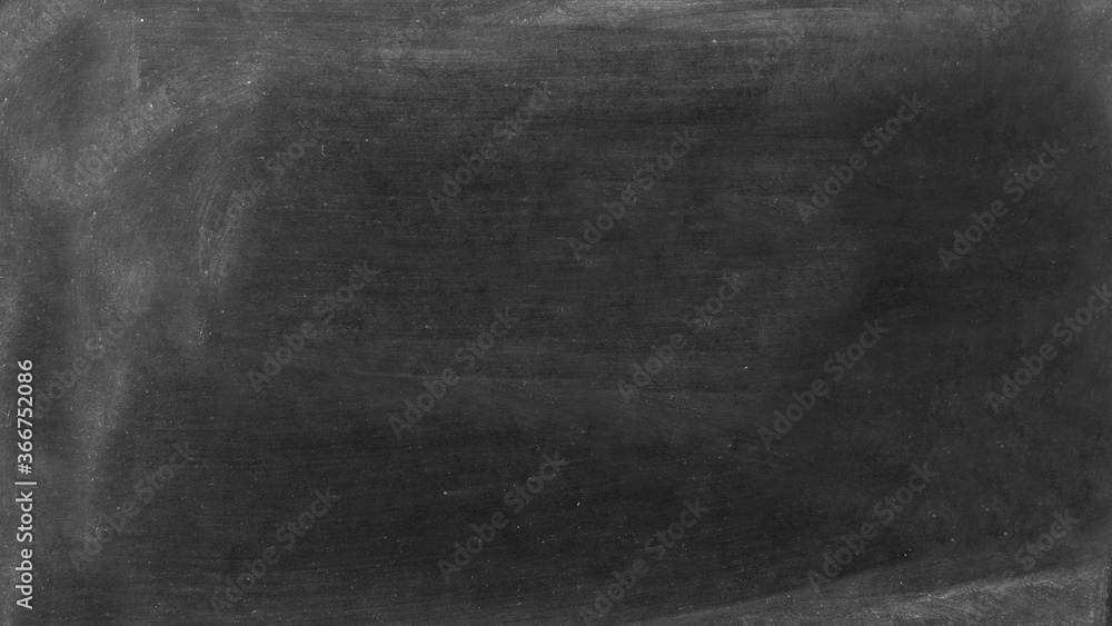 Fototapeta premium The dirty surface of the black chalk Board.Texture or background.