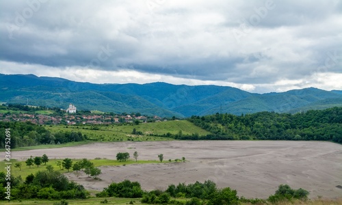 the tailings dumps of a mine between the hills photo