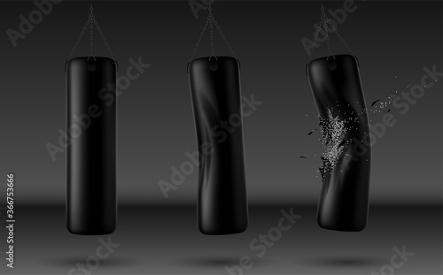 Black punching bag set on black background
