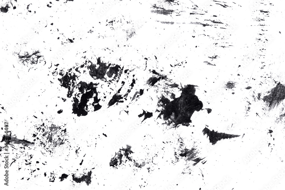 Abstract drops and smears of black acrylic paint isolated on a white background.