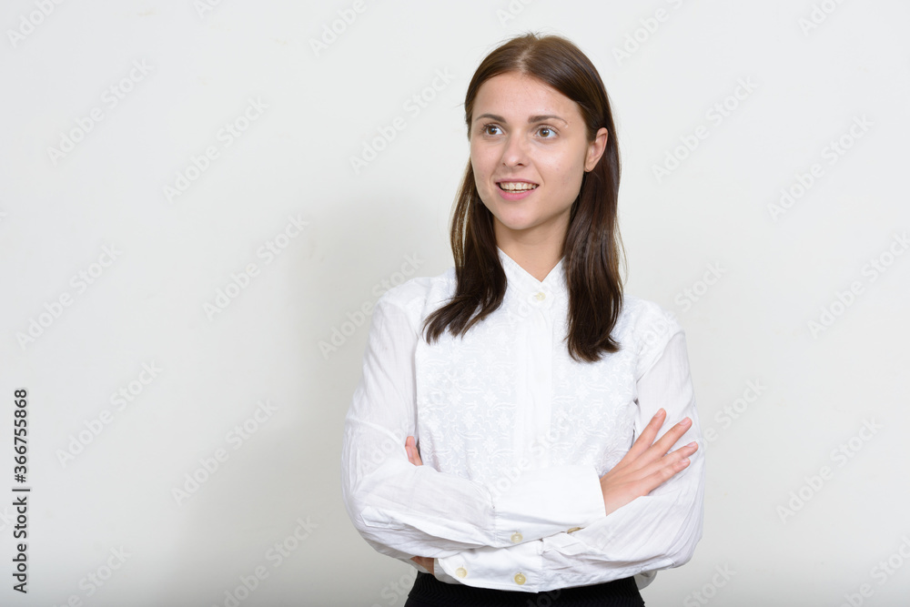 Portrait of young beautiful businesswoman against white background Portrait of young beautiful businesswoman against white background