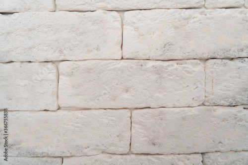 Square white brick wall .Texture or font