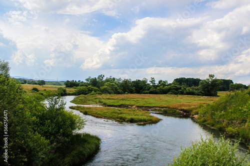 landscape with river and blue sky