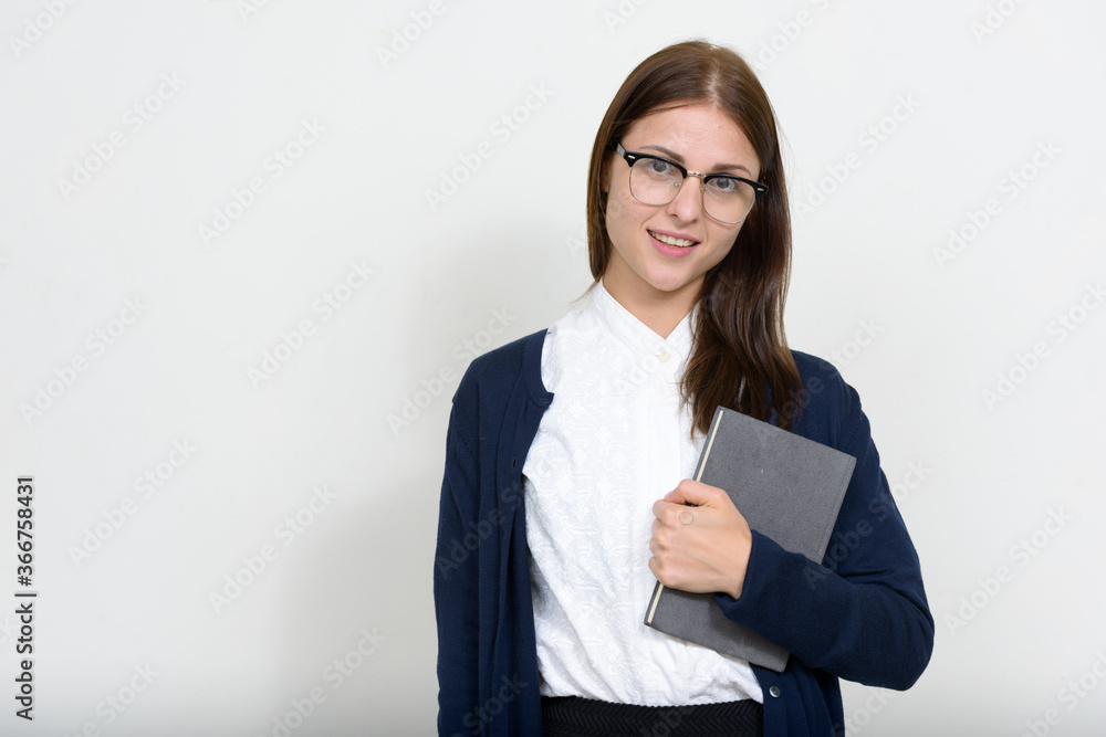 Portrait of young beautiful businesswoman against white background Portrait of young beautiful businesswoman against white background