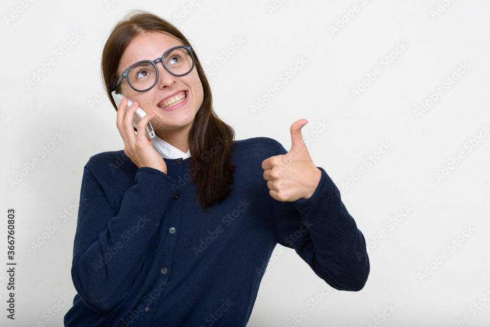 Portrait of young beautiful businesswoman against white background Portrait of young beautiful businesswoman against white background