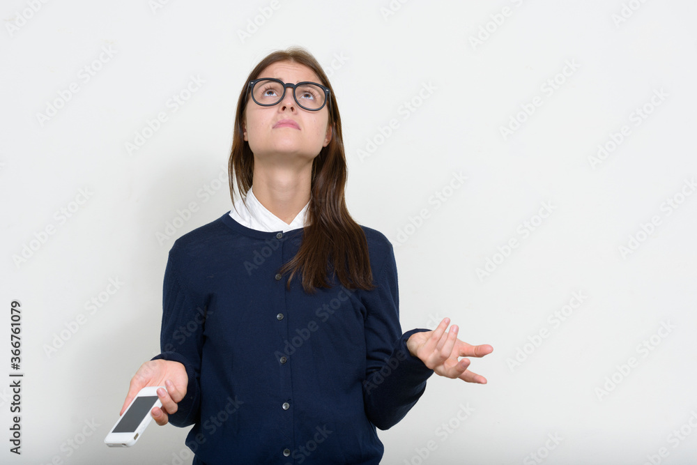 Portrait of young beautiful businesswoman against white background Portrait of young beautiful businesswoman against white background