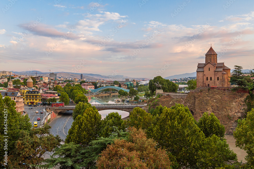 View over the Metekhi Church and Peace Bridge over the River Kura, in Tbilisi, Georgia.