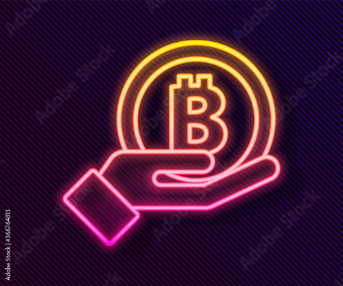 Glowing neon line Hand holding Bitcoin icon isolated on black background. Blockchain technology, digital money market, cryptocoin wallet. Vector.