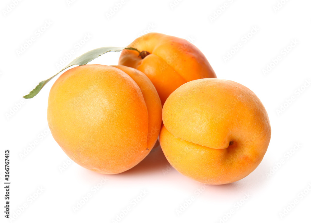 Tasty ripe apricots on white background Tasty ripe apricots on white background
