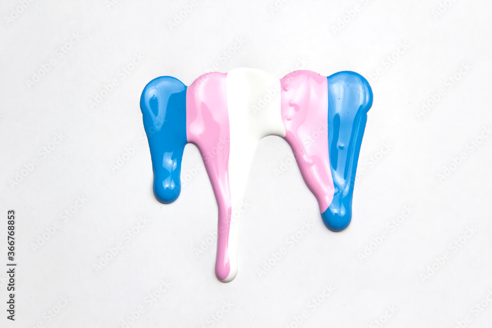 The paint colors of transgender flag - blue, pink,white. Conceptual illustration lesbian, gay, bisexual, and transgender. Colorful acrylic paint dripping on white background, copy space for text The paint colors of transgender flag - blue, pink,white. Conceptual illustration lesbian, gay, bisexual, and transgender. Colorful acrylic paint dripping on white background, copy space for text