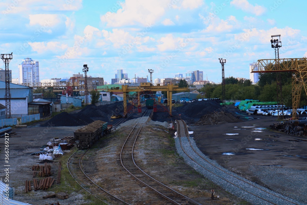 Fototapeta premium Railway station with many tracks and wagons