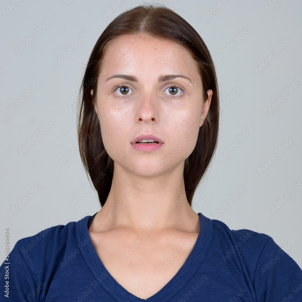 Face of young beautiful woman looking at camera Face of young beautiful woman looking at camera