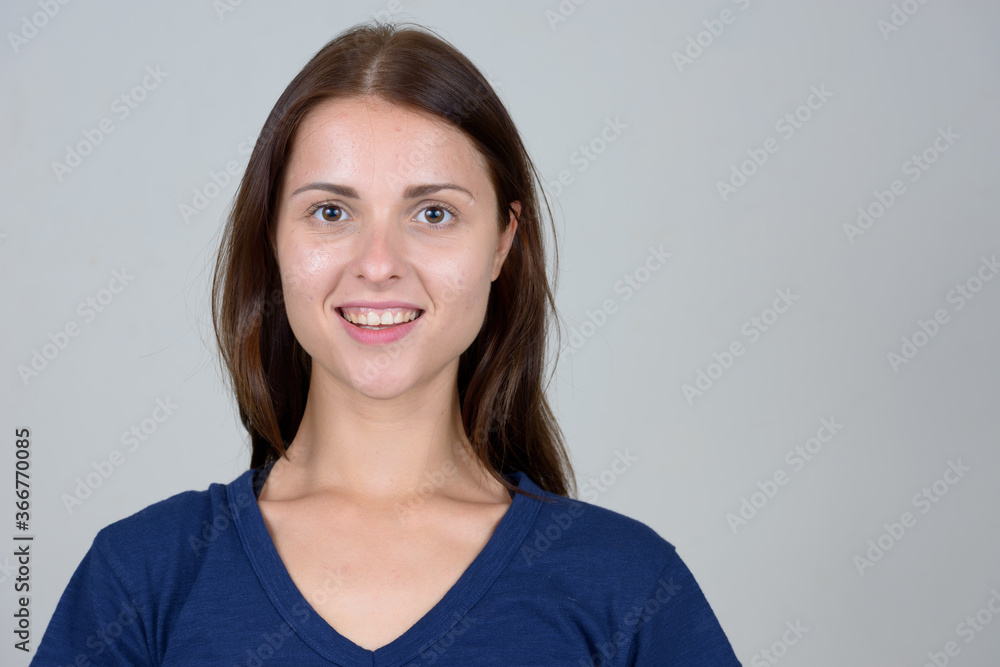 Face of young beautiful woman looking at camera Face of young beautiful woman looking at camera
