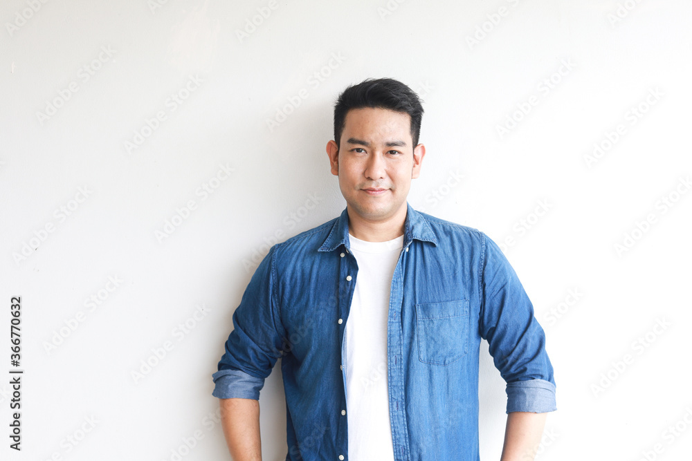 Asian handsome man on blue shirt white background Asian handsome man on blue shirt white background