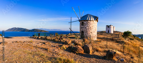 Bodrum - popular tourist coastal town in Turkey. Traditional old windmills photo