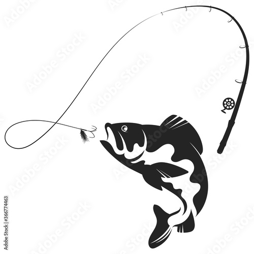 Fish jumping for bait and fishing rod silhouette