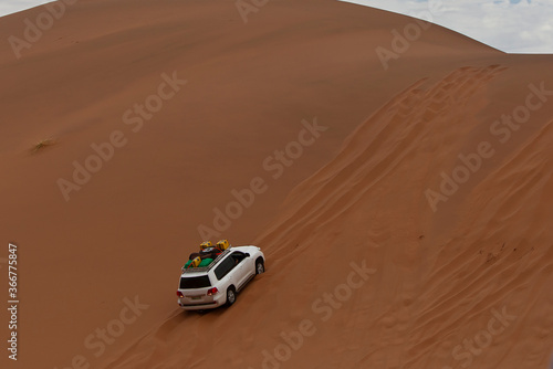 Riding sand dunes in the Namib desert