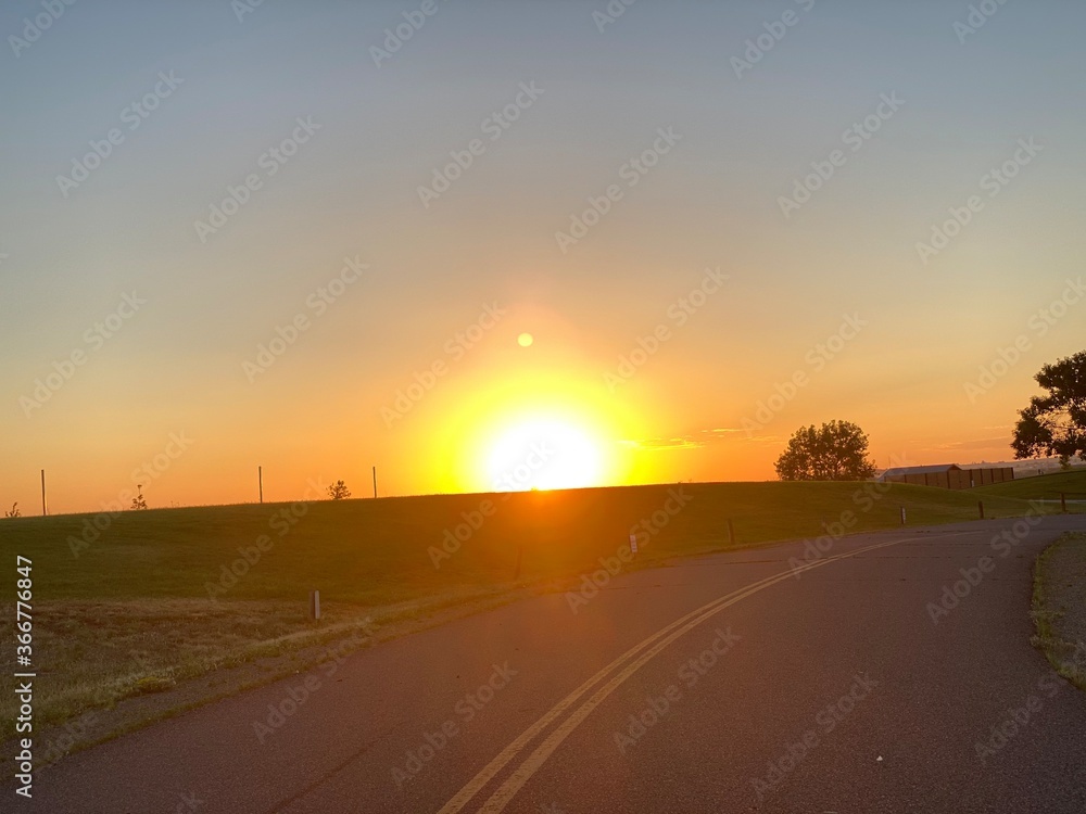 sunrise over the road