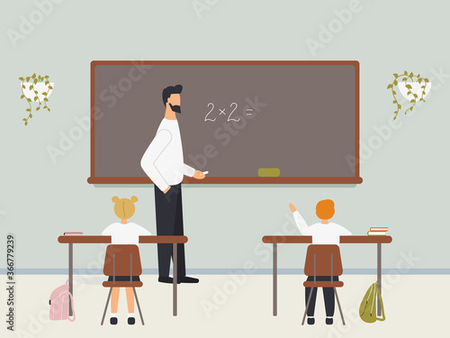 Male math teacher explaining multiplication to elementary school pupils or children near chalkboard. Young man teaching mathematics or arithmetic to kids sitting at desks in class.Vector illustration